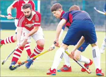  ?? Picture: Andy Jones FM5046932 Buy this picture from kentonline.co.uk ?? Marcus Bawden, left, in the thick of the action for Sutton Valence 1sts in their 2-2 draw against Brighton & Hove 2nds