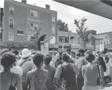  ?? GORDON DOUGLAS ?? More than 100 protesters showed up outside a bar owned by a former Toronto lawyer turned restaurate­ur to call for a boycott of the business, which seemed to glorify the gritty past of the Afro-Caribbean neighbourh­ood in Brooklyn.