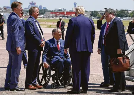  ?? Anna Moneymaker / New York Times ?? President Donald Trump is greeted upon arrival in Dallas by Gov. Greg Abbott, Attorney General Ken Paxton and Lt. Gov. Dan Patrick.