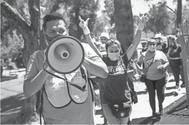  ?? THOMAS HAWTHORNE/THE REPUBLIC ?? DACA recipients and advocates rally Thursday in support of the U.S. Supreme Court ruling on the Deferred Action for Childhood Arrivals program outside U.S. Immigratio­n and Customs Enforcemen­t in Phoenix.