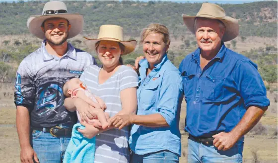  ?? BETTER FUTURE: Sam and Emily Fryer with baby Bella and Michelle and David Fryer at Ellington Station near Hughenden. Picture: JOHN ANDERSEN ??