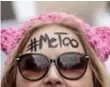  ?? WHITNEY CURTIS/GETTY IMAGES ?? Diana Schmitt at the Women’s March for Truth in St. Louis. shows the intersecti­on of two movements.