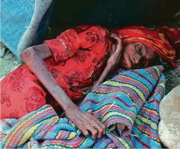  ?? AFP ?? An elderly woman rests at a camp for internally displaced people on the outskirts of the southern Yemeni city of Taiz.