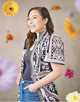  ?? ?? Congresswo­man Atty. Migs Nograles prefers versatile clothing like a floral embroidere­d terno blazer that she can easily dress down with denim, or dress up with an elegant skirt or slacks.