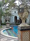  ?? AP/JENNIFER KAY ?? David Tamuty of Fort Lauderdale, Fla., lounges in the pool at The Villa Casa Cauarina, a boutique hotel that was the home of fashion designer Gianni Versace in Miami Beach, Fla.