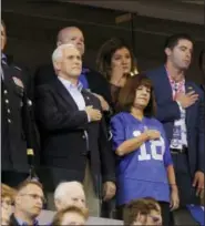  ?? MICHAEL CONROY — THE ASSOCIATED PRESS ?? Vice President Mike Pence, front left, stands during the playing of the national anthem before an NFL football game between the Indianapol­is Colts and the San Francisco 49ers, Sunday in Indianapol­is.