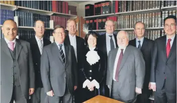  ??  ?? High Sheriff of Cambridges­hire, Penelope Walkinshaw with District Judge Robin Chaudhuri, His Honour Neil McKittrick, District Judge Anthony Wharton, His Honour Judge Nic Madge, His Honour Christophe­r Young, His Honour Judge Peter Greene, His Honour...