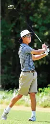  ?? STAFF PHOTO BY ROBIN RUDD ?? Walker Valley’s Parker Gray tracks the flight of his drive on the 18th tee during Wednesday’s tournament. He lost a playoff with McCallie eighth-grader Joe Carter after both finished regulation play with par scores. Baylor won the boys’ team title and...