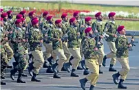  ?? APP, AFP ?? President Mamnoon Hussain addressing on the occasion of Pakistan Day parade. Prime Minister Nawaz Sharif, Defence Minister Khawaja Asif and Chairman Joint Chiefs of Staff Committee and services chiefs are also present; right, troops from the Special...