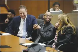  ?? ASSOCIATED PRESS ?? Juan Rayford (second from right) and Dupree Glass (far left) sit with their attorneys Eric Dubin (second from left) and Annee Della Donna during a hearing on their case Thursday at the Clara Shortridge Foltz Criminal Justice Center.