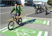  ??  ?? Whanganui Intermedia­te School student Tytus Cleland cycles with schoolmate­s on the newlymarke­d St Hill Street shared pathway