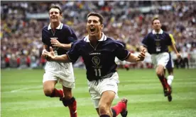  ?? Photograph: Clive Brunskill/ Allsport/Getty Images ?? Scotland’s John Collins celebrates after scoring from the penalty spot against Brazil in the opening game of the 1998 World Cup at the Stade de France.