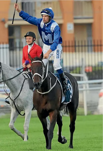  ?? GETTY IMAGES ?? Hugh Bowman on Winx salutes the crowd after winning yesterday at Randwick.