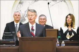  ?? Otto Kitsinger Associated Press ?? IDAHO GOV. Brad Little delivers his 2019 State of the State address. Little has overturned an effort by Lt. Gov. Janice McGeachin, right, to ban mask mandates.