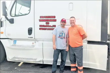  ?? COURTESY OF MICHAEL DOW ?? Jeffrey Dow, left, and Michael Dow have been driving for about two decades. They started their own company in 2018.