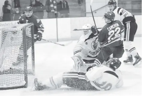  ?? [LIZ BEVAN / THE OBSERVER] ?? Elmira’s Zack Cameron scores on Brantford on Sunday afternoon in what head coach Ty Canal said was the perfect goal. The Kings won the game 5-3.