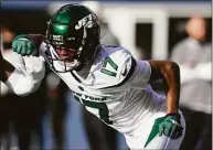  ?? Godofredo A. Vásquez / Associated Press ?? New York Jets wide receiver Garrett Wilson, the 10th overall pick last April, has set the team rookie marks with 74 receptions for 1,014 yards.