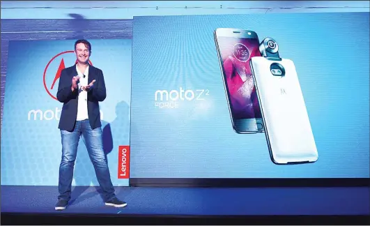  ?? (AFP) ?? Rudi Kalil vice-president & general manager, North America Lenovo Mobile Business Group and Motorola, introduces the new Moto Z2 force phone during an event in New York on
July 25.