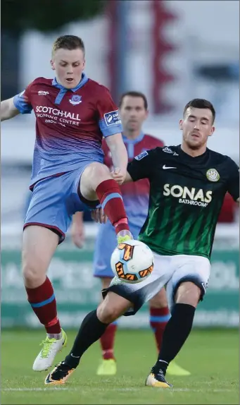  ??  ?? Drogheda United’s Richie Purdy gets a step ahead of Aaron Greene of Bray Wanderers during last season’s ill-fated Premier campaign.