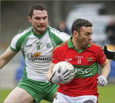  ??  ?? Rathnew captain Leighton Glynn in action against Mikey English in the semi-final against Baltinglas­s.