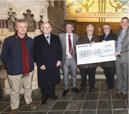  ??  ?? Rotary cheques presentati­on to Society of Vincent De Paul at Drumcliffe Church h of Ireland: Padraic McAuliffe, Gerry Cannon, Cllr Hubert Keaney, Coleman O’Callaghan,Rev Isaac Hanna, Niall Brennan, Sean Doy yle, Niall Canning and Arnie Griffin.