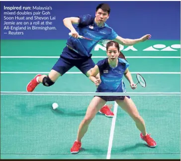  ?? Reuters ?? Inspired run: Malaysia’s mixed doubles pair Goh Soon Huat and Shevon Lai Jemie are on a roll at the All-England in Birmingham. —