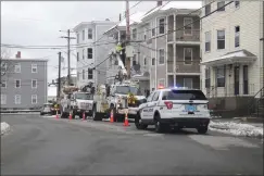  ?? Ernest A. Brown photo ?? National Grid crews were kept busy on Thursday repairing downed wires and restoring power, including this line on Fales Street in Central Falls.