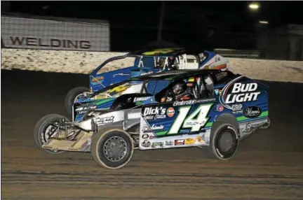  ?? SUBMITTED PHOTO - RICK KEPNER ?? Billy Pauch Jr. (14) and Ryan Watt race during the Mods at the Madhouse race at Grandview Speedway on Oct. 16.