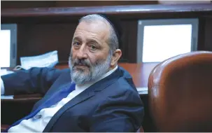  ?? (Yonatan Sindel/Flash90) ?? ARYE DERI sits in the Knesset plenum.