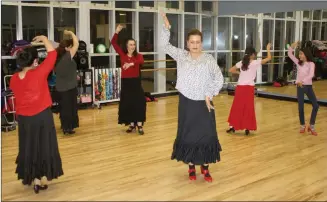  ?? Courtesy photo ?? Santa Clarita Valley residents practice their movements and footwork during Mari Sandoval’s Flamenco class at the Newhall Community Center in 2017. Sandoval is trained in both Flamenco and classical dancer.