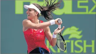  ?? Picture: USA TODAY SPORTS ?? CAREER BEST: Johanna Konta of Great Britain hits a forehand against Caroline Wozniacki of Denmark to win the women’s singles championsh­ip of the Miami Open at Crandon Park Tennis Centre on Saturday