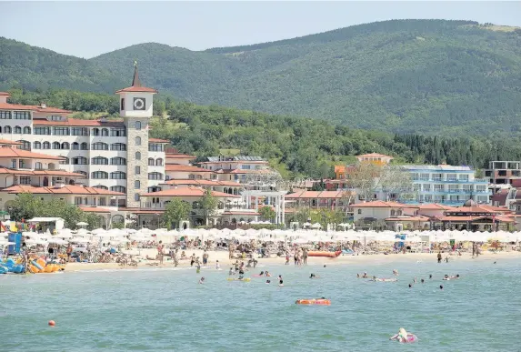  ?? Nikolay Dimitrov ?? > The beach at Sunny Beach, Bulgaria, is the cheapest holiday destinatio­n for UK sun-seekers, according to Post Office Travel Money