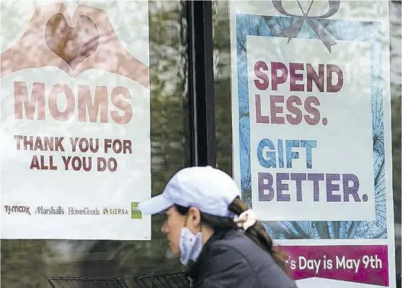  ?? (Photo:ap) ?? Signs about Mother’s Day are displayed at a home decor department store in Northbrook, Illinois, on Saturday, May 8, 2021.