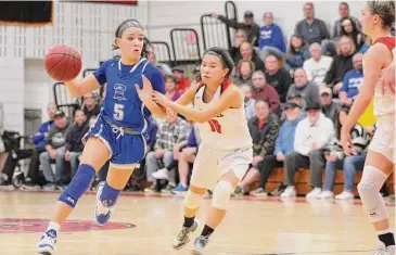  ?? Paul Augeri/For Hearst Connecticu­t Media ?? East Hampton’s Liana Salamone scored her 1,000th career point.