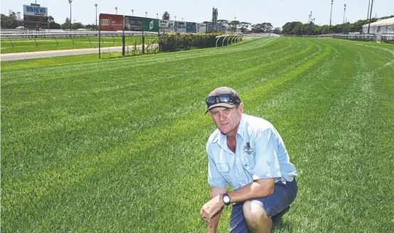  ?? Picture: Bev Lacey ?? TRACK GOOD: Clifford Park racecourse manager Dave Morrison inspects the course proper yesterday.