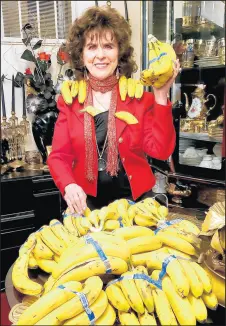  ?? EVELYN LAHAIE ?? Evelyn LaHaie, of Hobart, surrounded by a bounty of bananas mistakenly delivered to her by a local market.