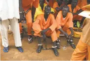  ?? Associated Press ?? Prisoners gather at a prison in Juba. Some have languished in jail since civil war began in 2013.