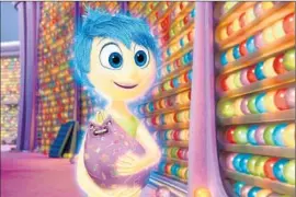  ?? Disney ?? JOY (VOICED by Amy Poehler) is one of a girl’s Emotions in “Inside Out.”