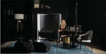  ?? (The New York Times/JerSean Golatt) ?? The home of Tabitha Kane, a co-host of the podcast Housewives of True Crime, has a faux fireplace in her home office that leads to a secret room.