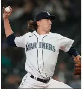  ?? (AP/Ted S. Warren) ?? Seattle Mariners right-hander Logan Gilbert is 4-0 with an American League-leading 0.64 ERA through Sunday’s games. The former Arkansas Traveler is also among the league leaders in strikeouts with 27. Gilbert and Miami Marlins righty Pablo Lopez, who leads the majors in ERA (0.39), earned the AL and NL Pitcher of the Month awards for April on Monday, respective­ly.