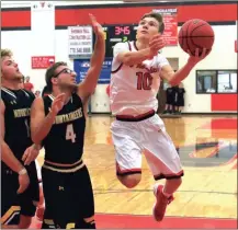  ?? File-LARRY GREESON / For the Calhoun Times ?? Sonoravill­e’s Wil Walraven goes up for a shot during a game earlier this season. Walraven had 24 points on Tuesday.