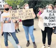  ??  ?? Images of campaigner­s at the Black Lives Matter protest which took place outside Southport town hall on Saturday