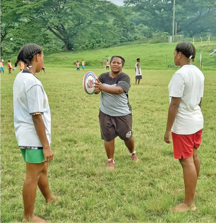  ?? ?? Timaima Marama taking part in the BULA TAG rugby programme.