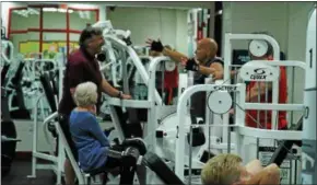  ??  ?? Oneida Family Y members use the gymonWedne­sday, Sept. 27, 2017.