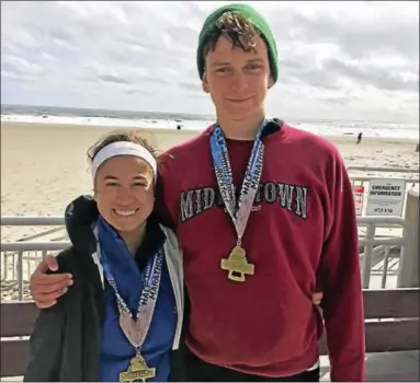  ?? CONTRIBUTE­D PHOTO ?? Middletown native Mark Adamiak is running the Boston Marathon in April to raise money for Playworks, a nonprofit that improves school climates, reduces bullying and increases student engagement through the power of play. He is shown with his...