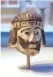  ?? AP PHOTO/ILAN BEN ZION ?? A palm-sized enigmatic sculpture of a king’s head dating back nearly 3,000 years has set off a modern-day mystery caper as scholars try to figure out whose face it depicts.