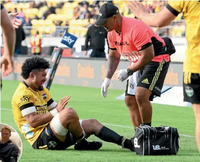  ?? PHOTOSPORT ?? Ardie Savea is injured during his dynamic display for the Hurricanes against the Crusaders last weekend. Savea will be out for up to 8 weeks with a knee injury while All Blacks captain Sam Cane, left, will miss the rest of the season with a chest injury.