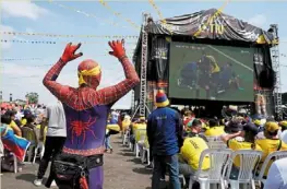  ?? — Reuters ?? Marvel-lous: an ecuador fan dressed as Spiderman watching his team’s match outside estadio modelo in Guayaquil.