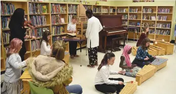  ??  ?? Students from Empire, Prince Arthur and Peacock play a song on the OrgelkidsC­AN pipe organ.