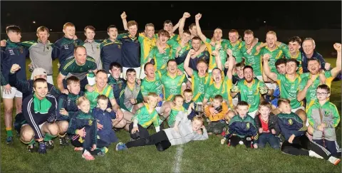  ??  ?? Rathgarogu­e-Cushinstow­n celebrate after bringing the Junior football title home for the first time since 1980.